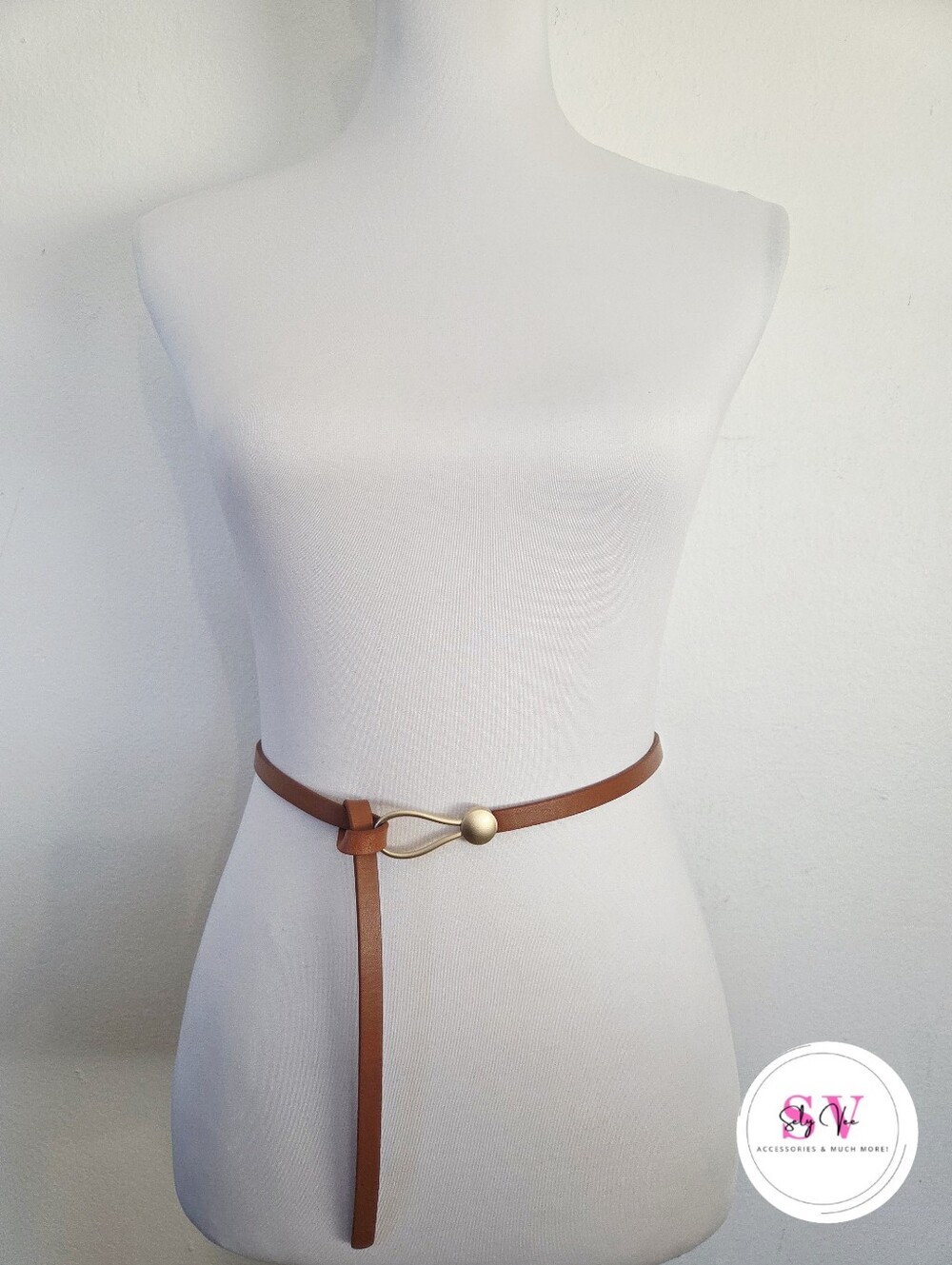 Brown thin belt with gold circular buckle